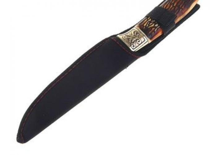Нож с ручкой под кость 27,5*3*2 см. с узором на рукояти